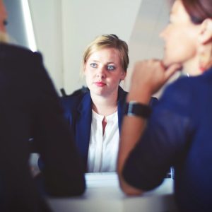 psychological safety - woman talking to colleagues